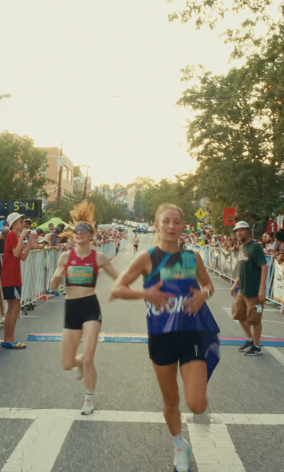 Marissa Coombs crossing the finish line at the 2026 Montclair Mile